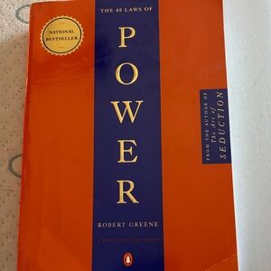 The 48 Laws of Power by Robert Greene - Orange Cover